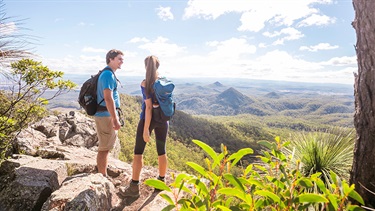 Hikers at lookout over mountains