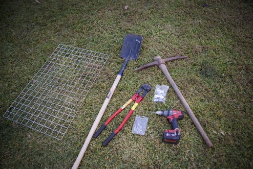 how to stop a dog from going under the fence